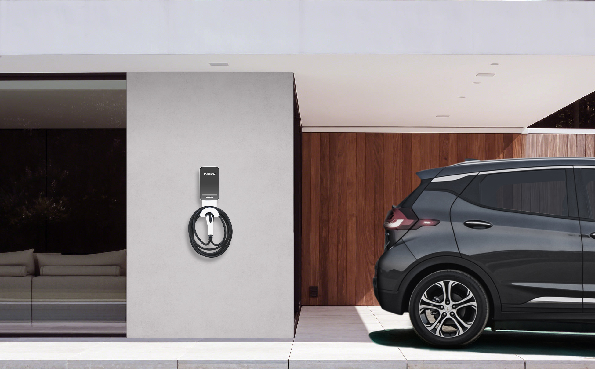 JuiceBox charging station mounted on a wall